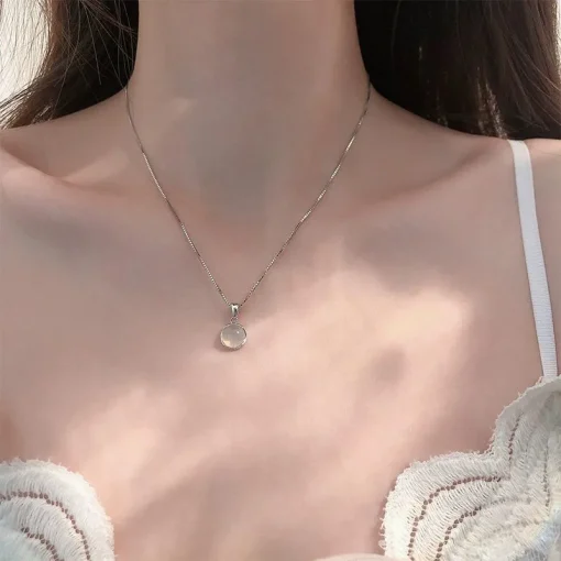 kf S2ee475b8962347a6bf291cdb4de60732V New Luxury White Round Moonstone Pendant Necklaces Women Fashion Jewelry Choker Clavicle Chain Short Charm Necklace